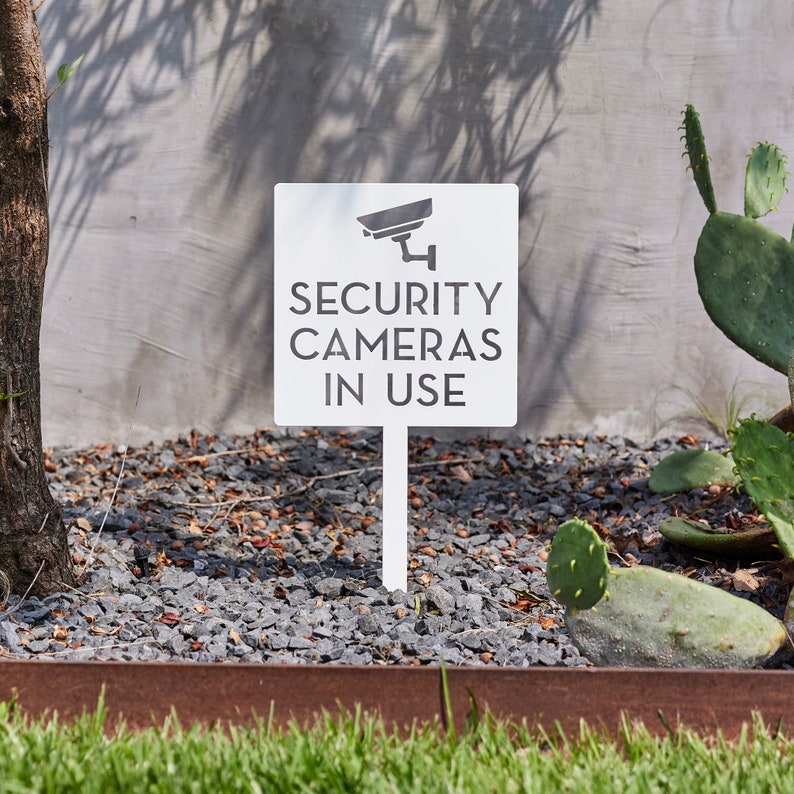 Home Yard Security Cameras - Tablica ostrzegawcza z kamerą monitoringu -